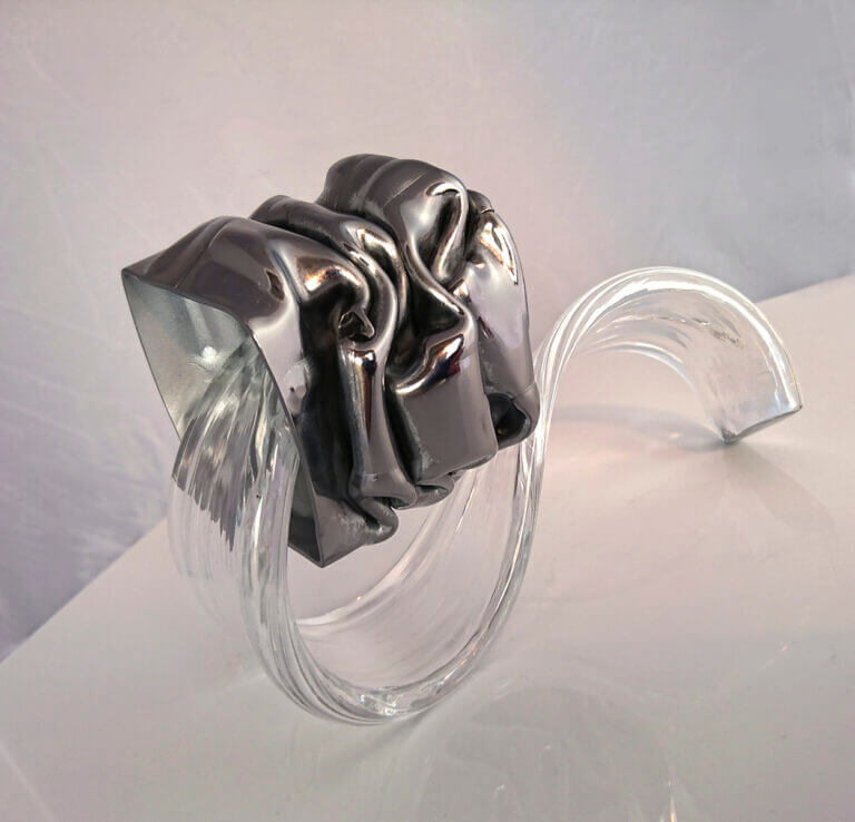 Photo sculpture Lächer-prise. Acier, verre – 15 x 12 x 9 cm